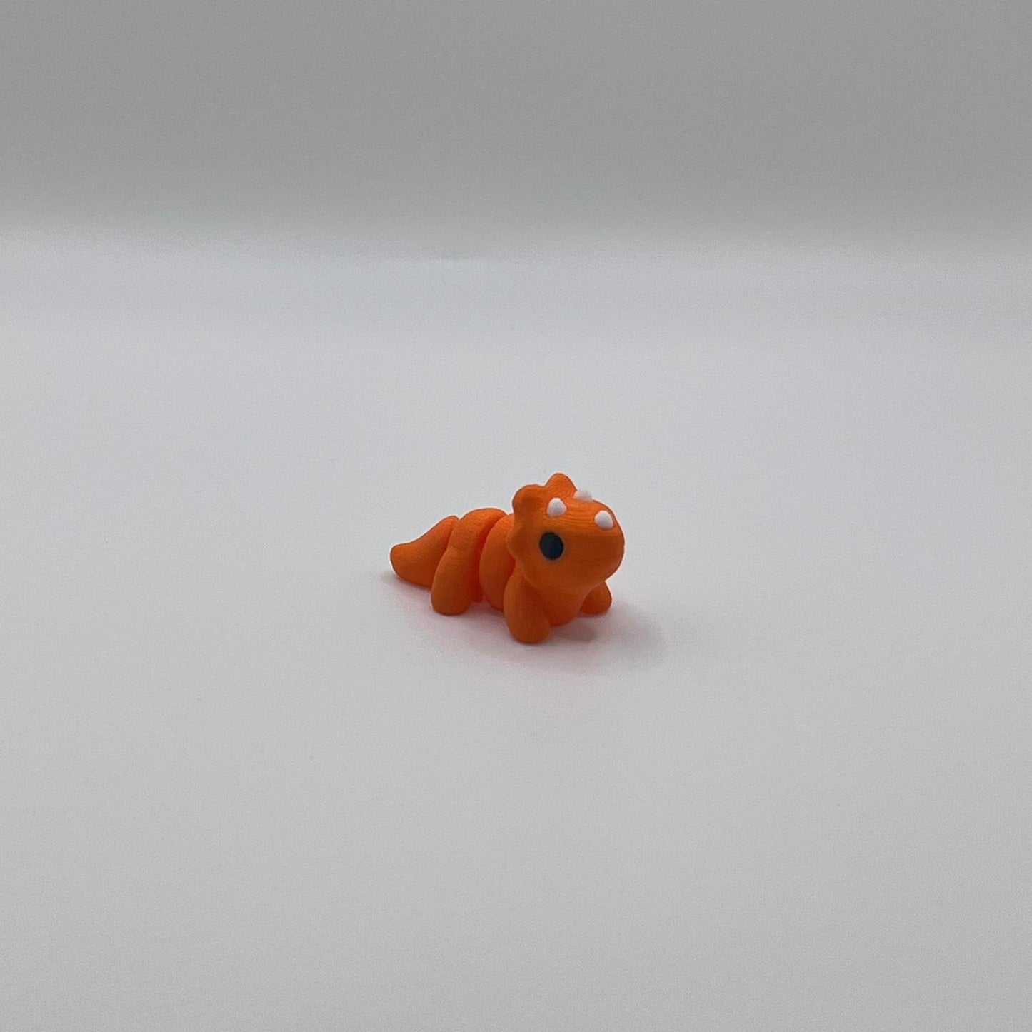 Mini Orange Dino – 3D Printed Pocket-Sized Dinosaur Collectible